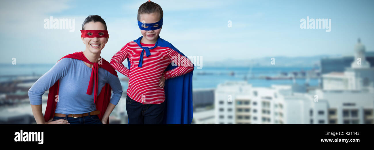 Composite image of mother and daughter pretending to be superhero Stock Photo