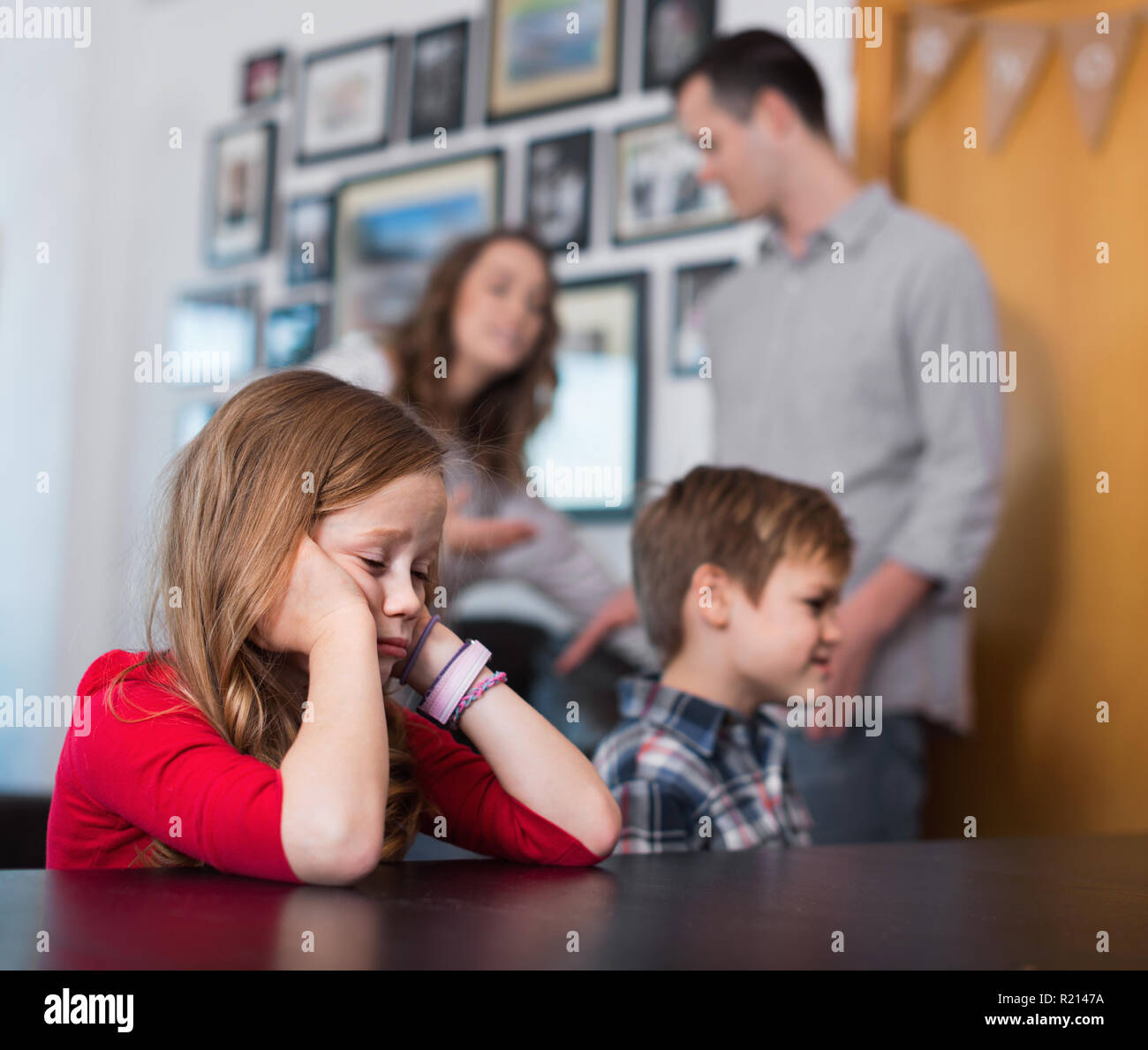 Young angry unhappy parents having bad row while their children at home Stock Photo Alamy