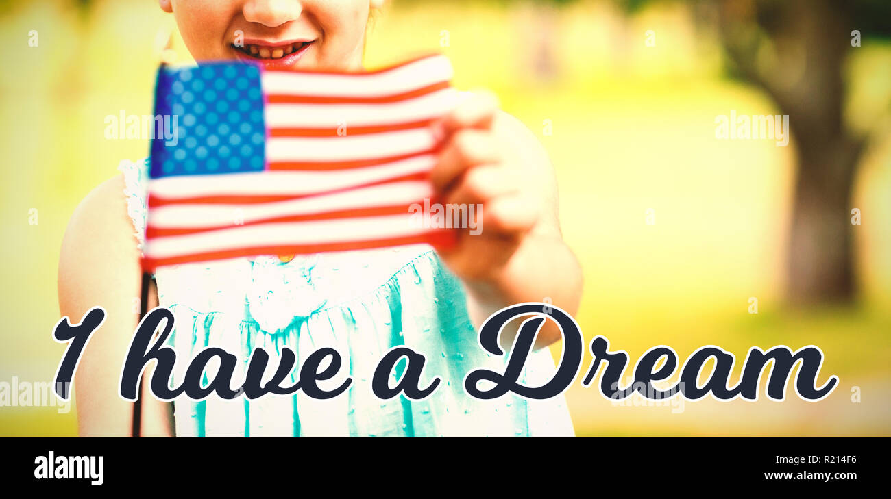 Composite image of portrait of girl showing american flag Stock Photo