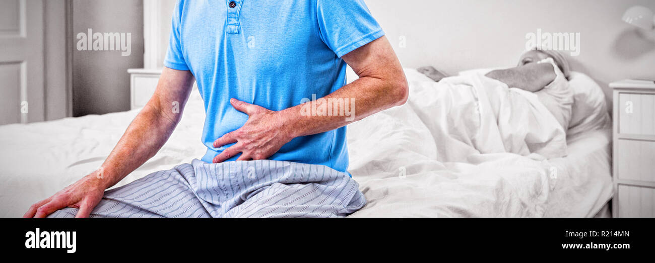 Senior Man Having Stomach Pain While Sitting On Bed Stock Photo Alamy senior-man-having-stomach-pain-while-sitting-on-bed-stock-photo-alamy