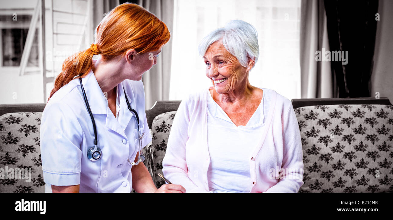 Doctor consulting with senior woman Stock Photo