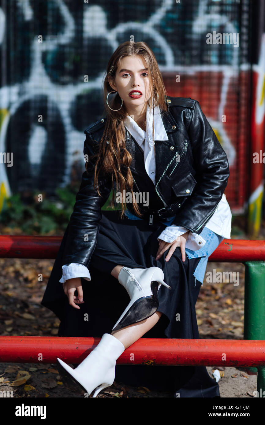 Charming beautiful photo model wearing white shirt and black jacket Stock Photo