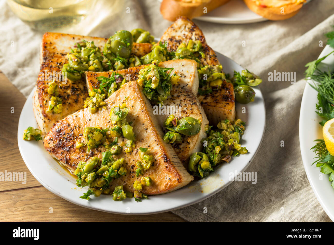Homemade Grilled Swordfish Steaks with Olive Topping Stock Photo Alamy