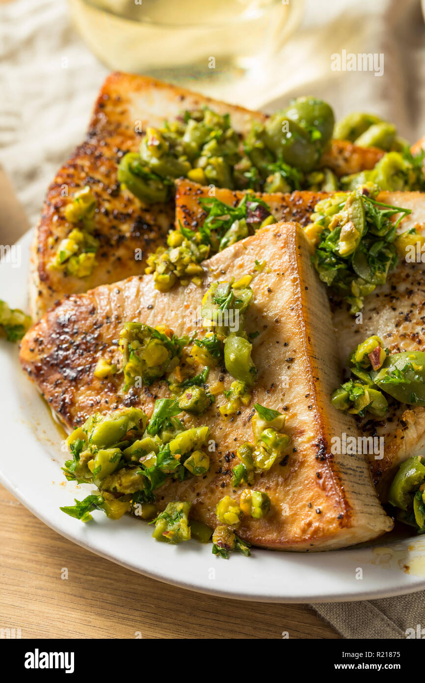 Homemade Grilled Swordfish Steaks with Olive Topping Stock Photo Alamy