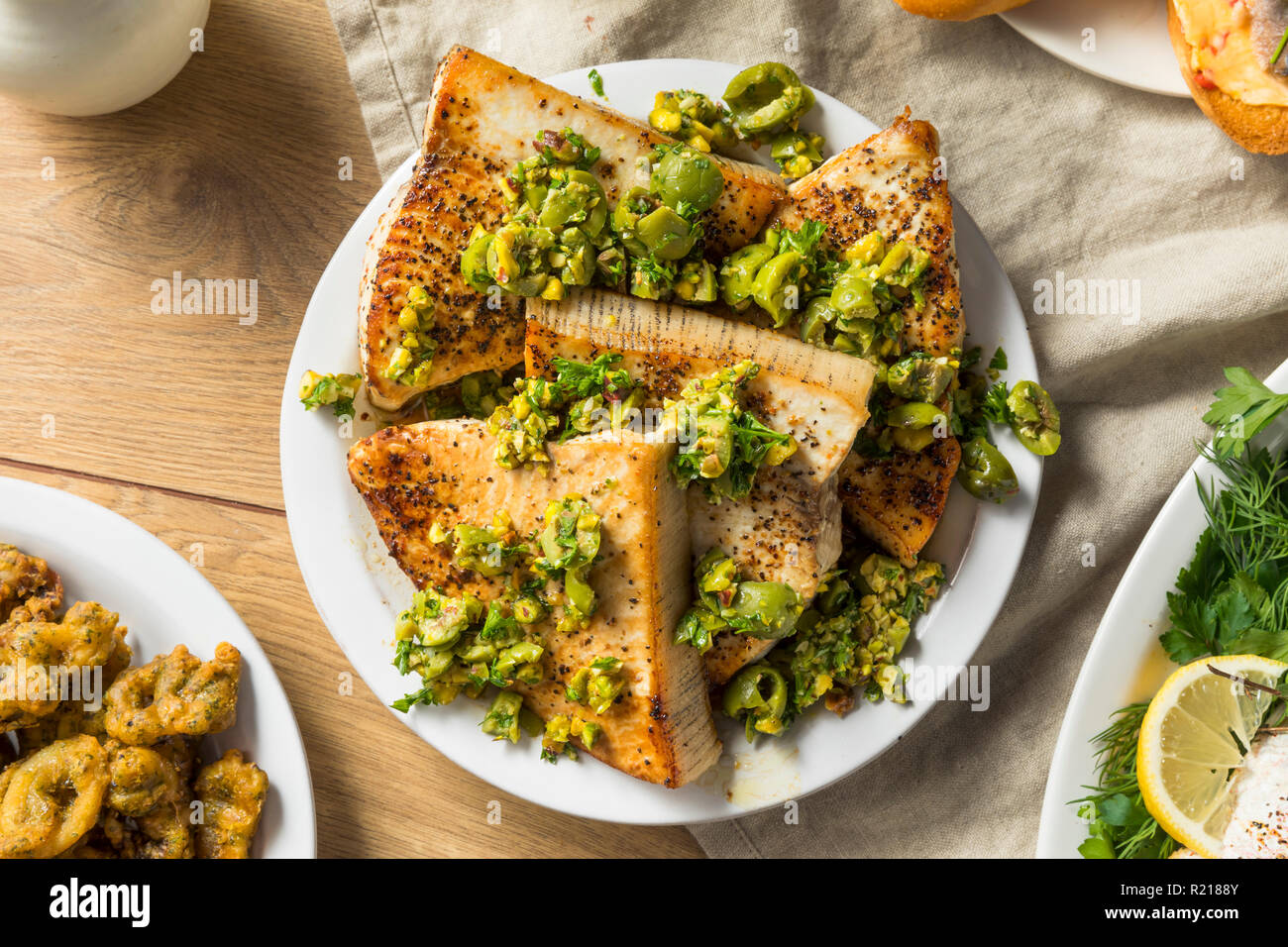 Homemade Grilled Swordfish Steaks with Olive Topping Stock Photo Alamy