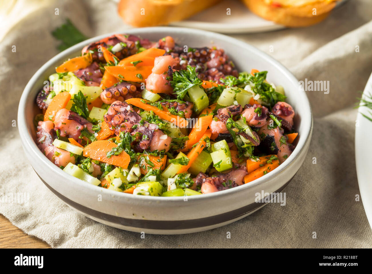 Homemade Mediterranean Octopus Salad with Vegetables and Dressing Stock