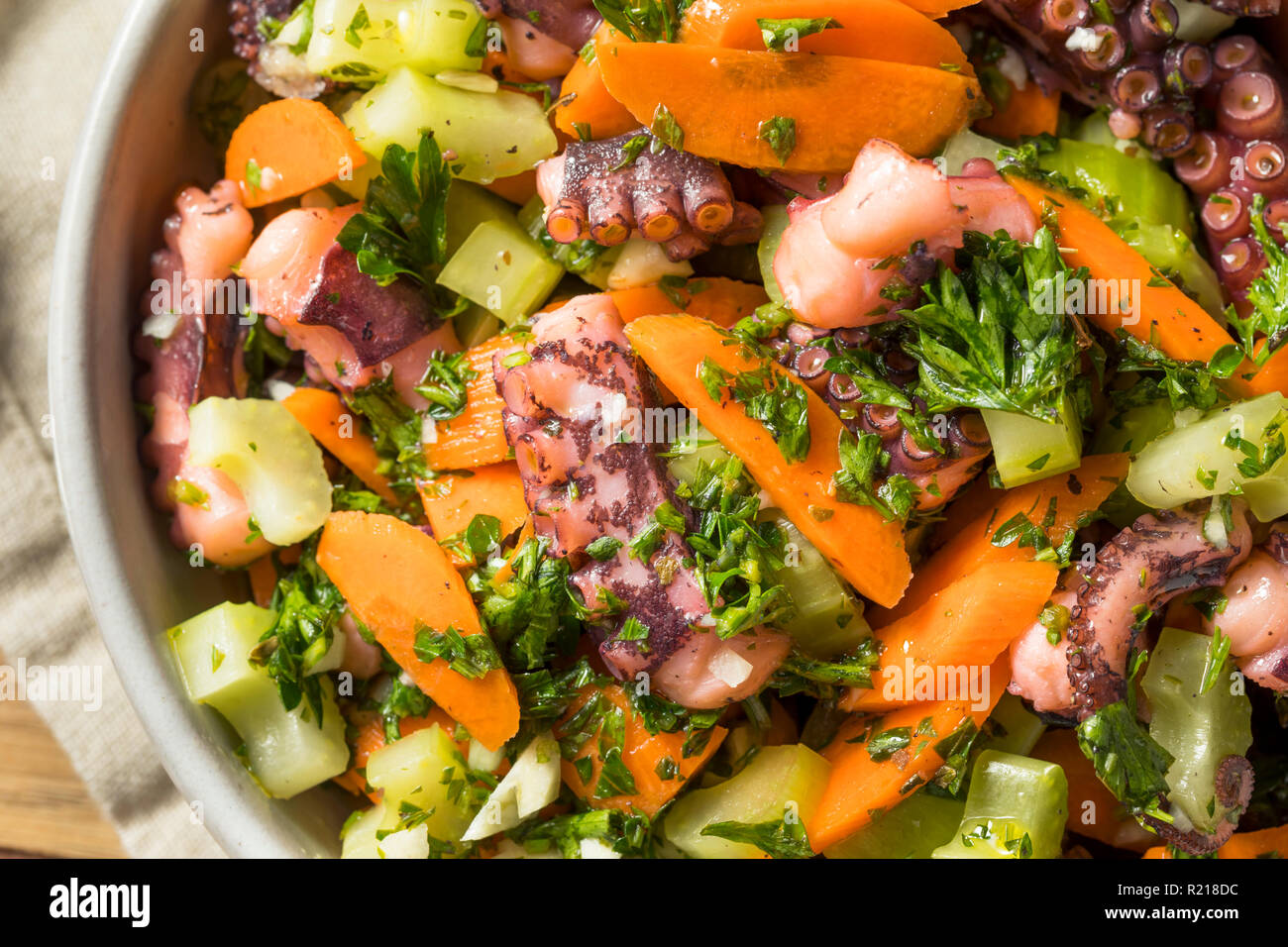 Homemade Mediterranean Octopus Salad with Vegetables and Dressing Stock