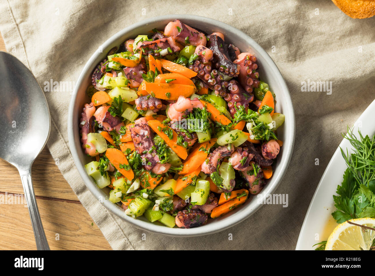 Homemade Mediterranean Octopus Salad with Vegetables and Dressing Stock