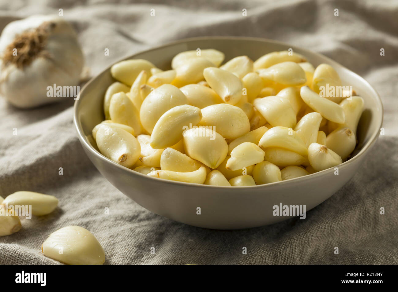 Raw Organic Peel Garlic Cloves for Cooking Stock Photo