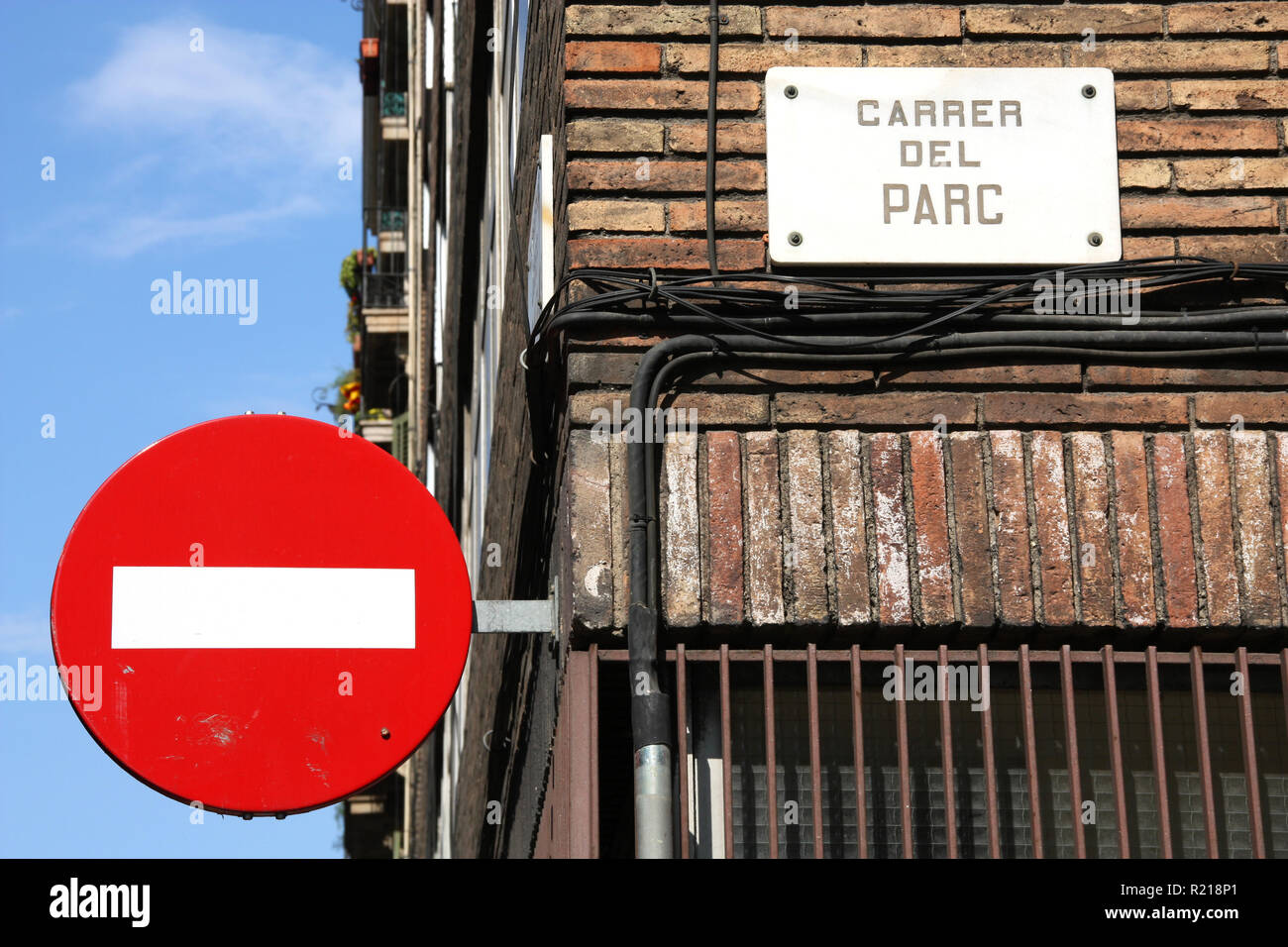 Street name in Barcelona, Spain. Carrer del Parc. No entry sign - city detail. Stock Photo