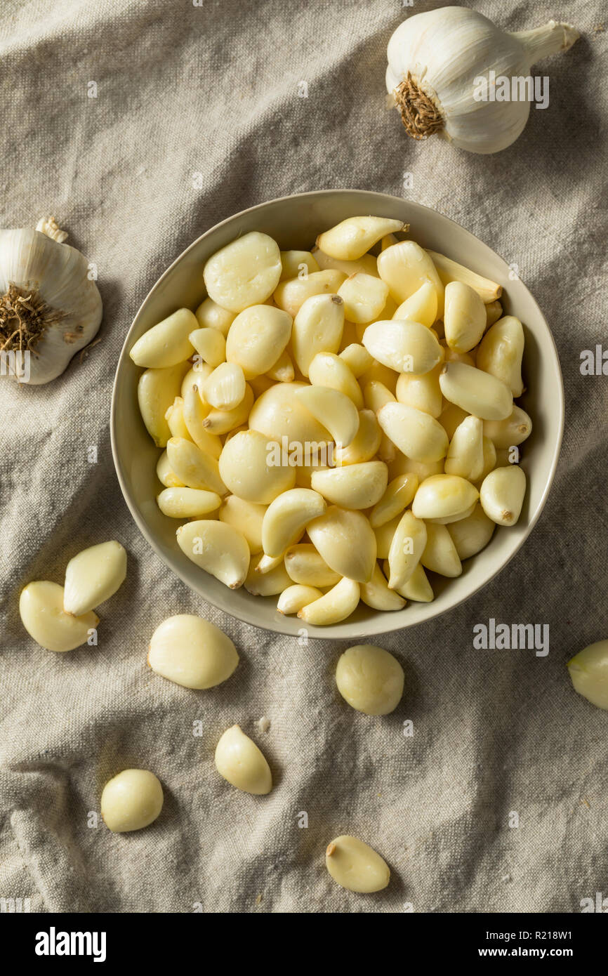 Raw Organic Peel Garlic Cloves for Cooking Stock Photo
