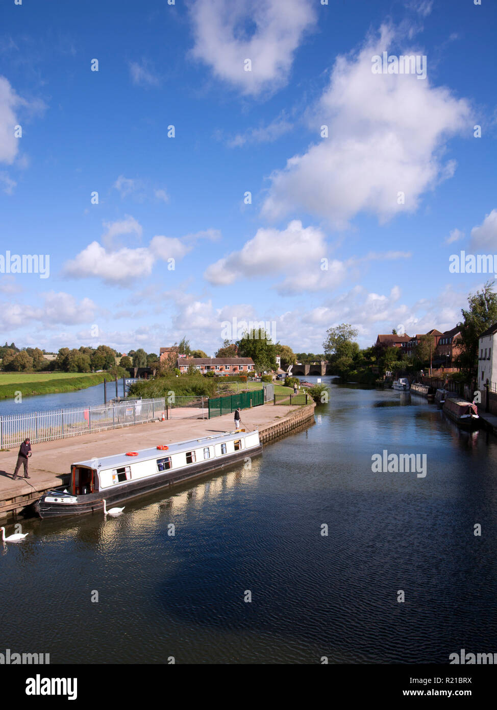 Tewkesbury, Gloucestershire, UK - 18th September 2012: A hired canal boat prepares to leave moorings along the Avon Navigation near the centre of Tewkesbury, Gloucestershire, UK Stock Photo