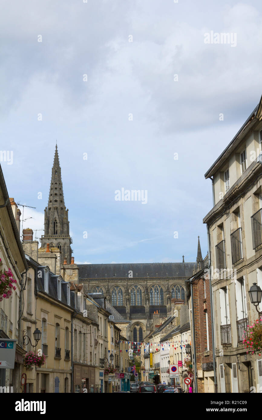 Sees, Normandy, France - 19th September 2014: Sees Cathedral towers above a busy shopping street, Orne, Normandy, France Stock Photo