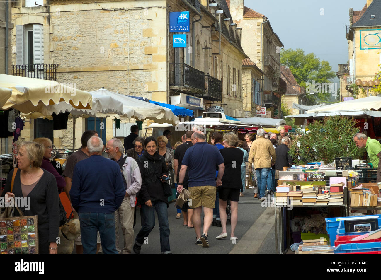 St-Cyprien, Dordogne, France - 24th September 2015: Crowded street at the Sunday street market in St-Cyprien, Dordogne, France Stock Photo