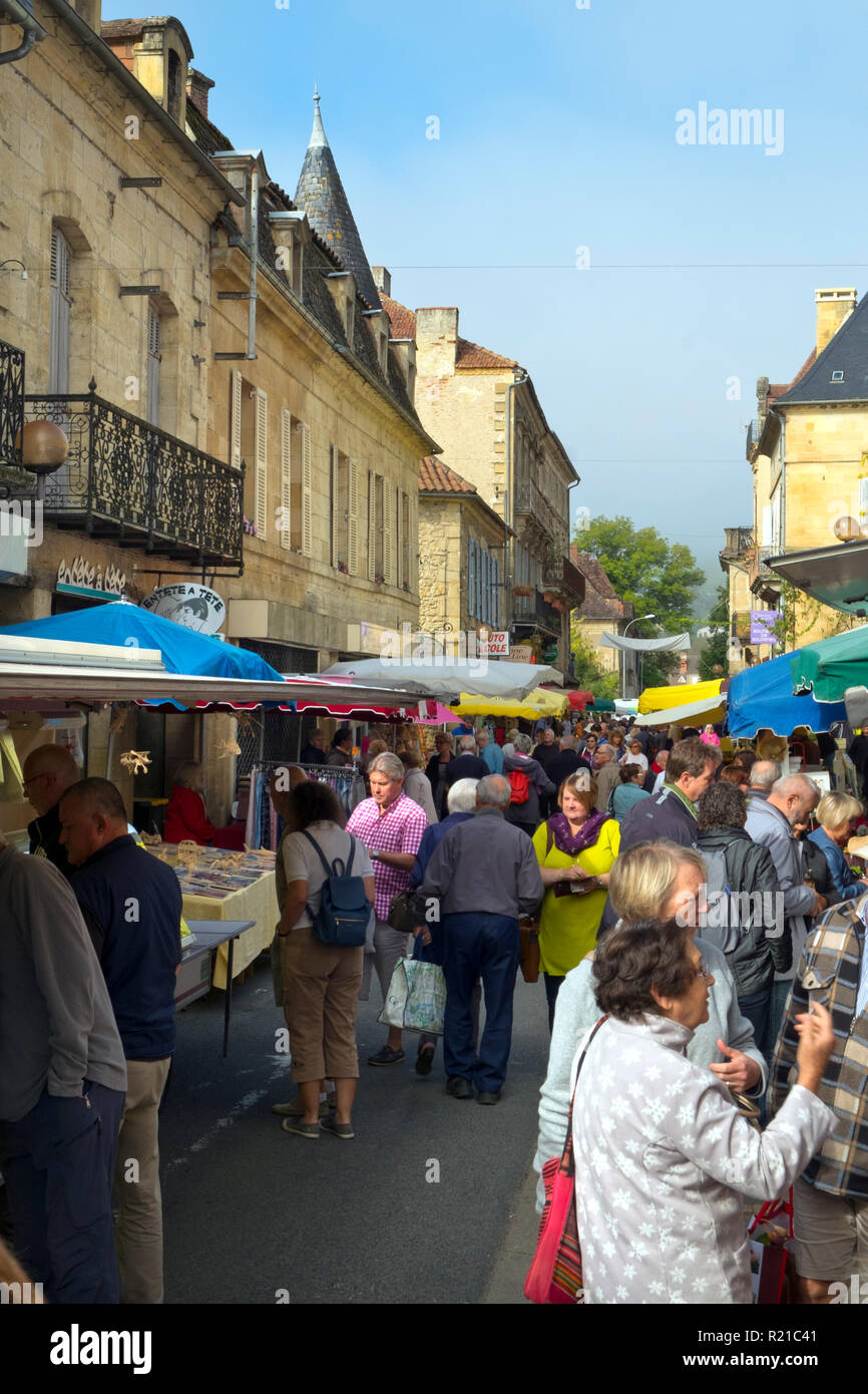 St-Cyprien, Dordogne, France - 24th September 2015: Crowded street at the Sunday street market in St-Cyprien, Dordogne, France Stock Photo