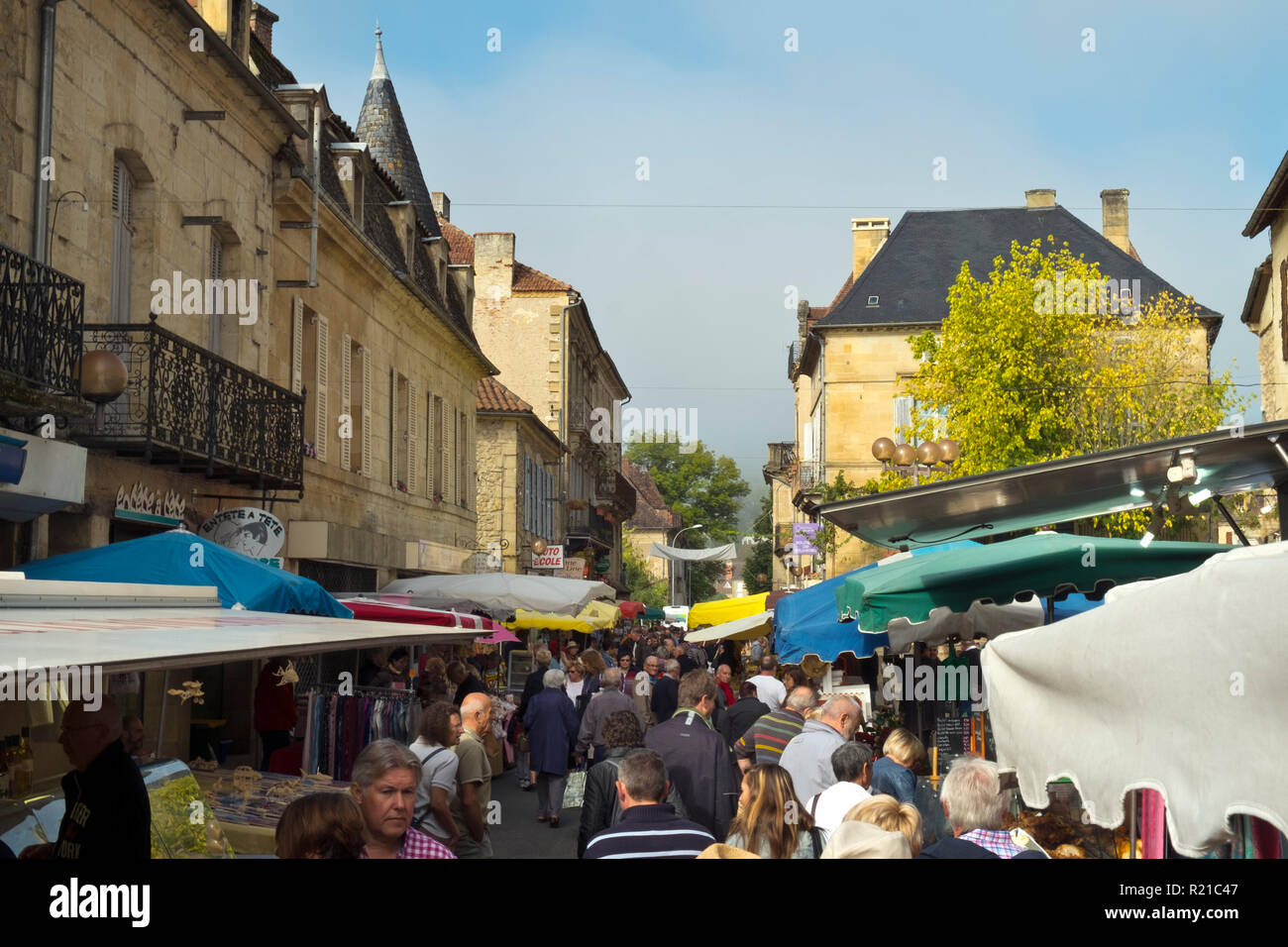 St-Cyprien, Dordogne, France - 24th September 2015: Crowded street at the Sunday street market in St-Cyprien, Dordogne, France Stock Photo