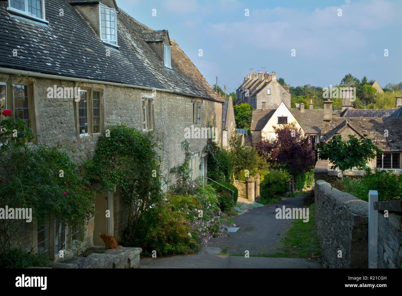 Quaint Cotswold stone cottages line the streets of Bisley, Gloucestershire, UK Stock Photo