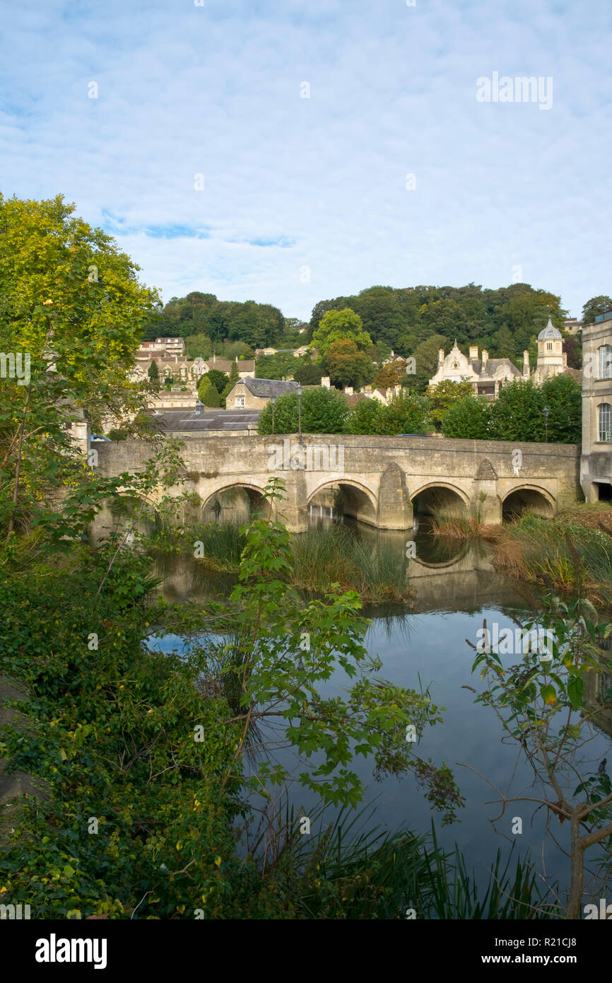 The well known ancient bridge over the River Avon with its one-time chapel and later lock-up in autumn sunshine, Bradford on Avon, Wiltshire, UK Stock Photo