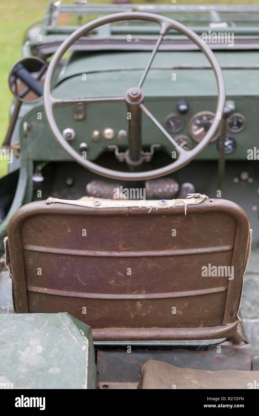 Steering wheel and dashboard of a Willys jeep on display at military vehicle show in the grounds of Durham Light Infantry Museum, Stock Photo