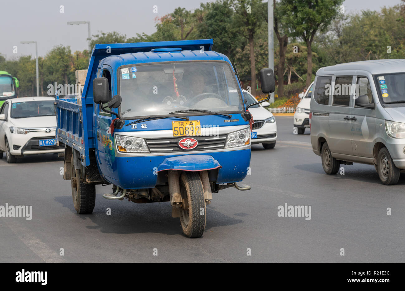 Three wheeler truck from WAW on streets of Xian China Stock Photo