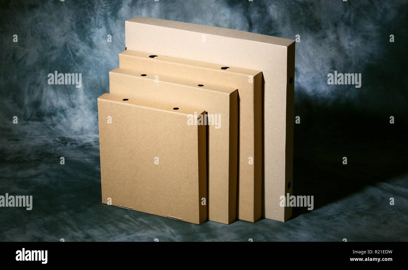 Shot of a set of different sized cardboard packaging Stock Photo