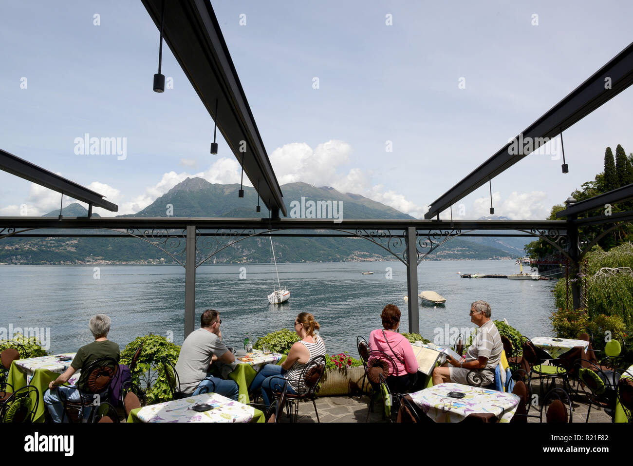 Lakeside dining at restaurant at Varenna on Lake Como Italy Stock Photo