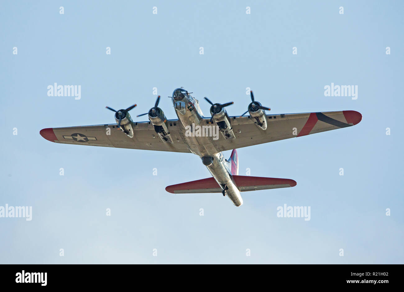 MONROE, NC (USA) - November 10, 2018: A B-17 "Flying Fortress" in flight against a clear blue sky at the Warbirds Over Monroe Air Show. Stock Photo