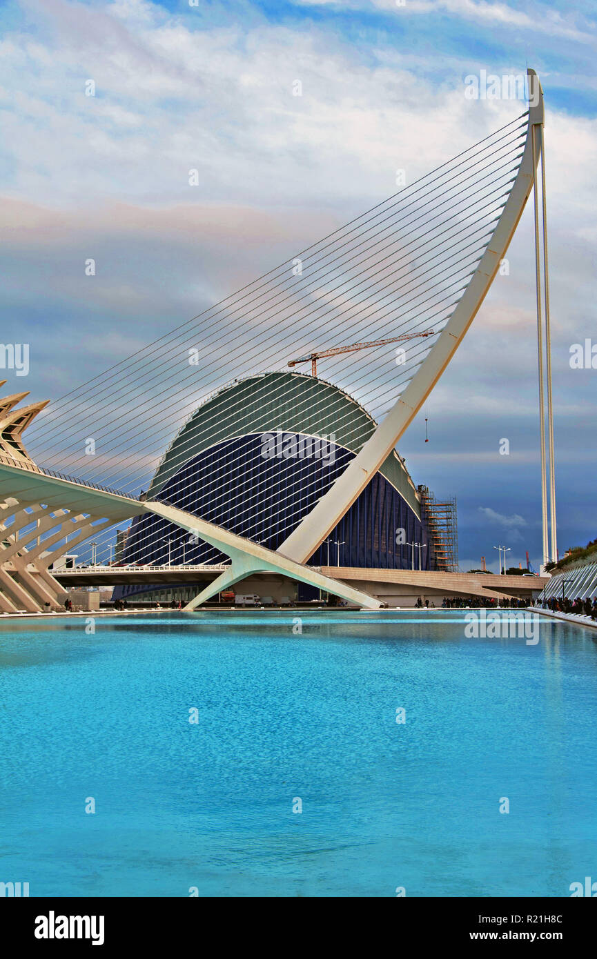 View of El Pont suspension bridge , Oceanografic building and museum of sciences from the water pool at the Art of Sciences, Valencia, Spain Stock Photo