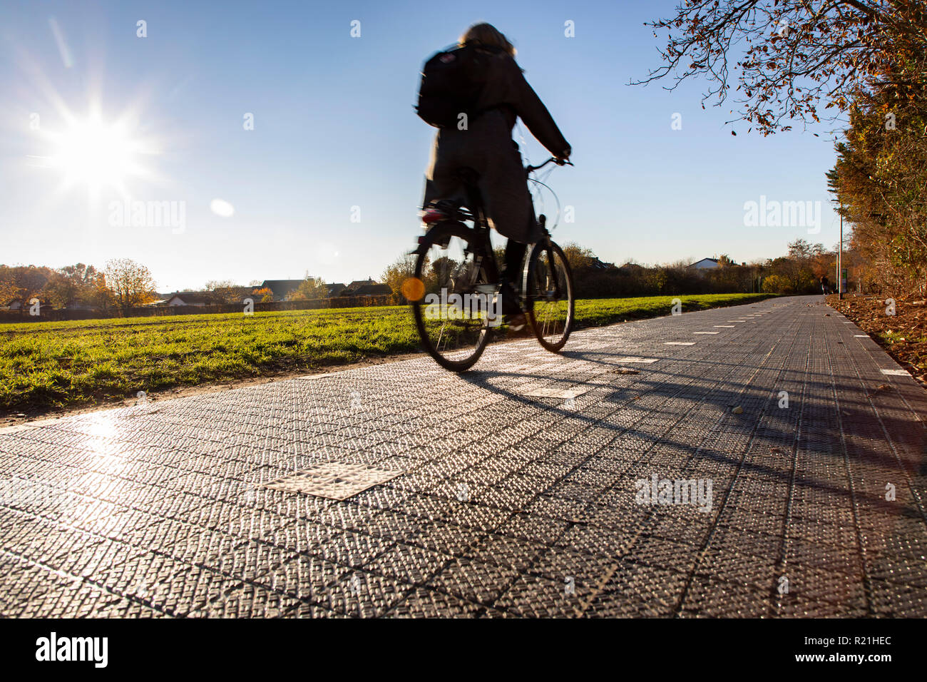 First solar cycle path in Germany, in Erftstadt, a 90 meter long test track with solar modules on the ground, that produce electricity Stock Photo