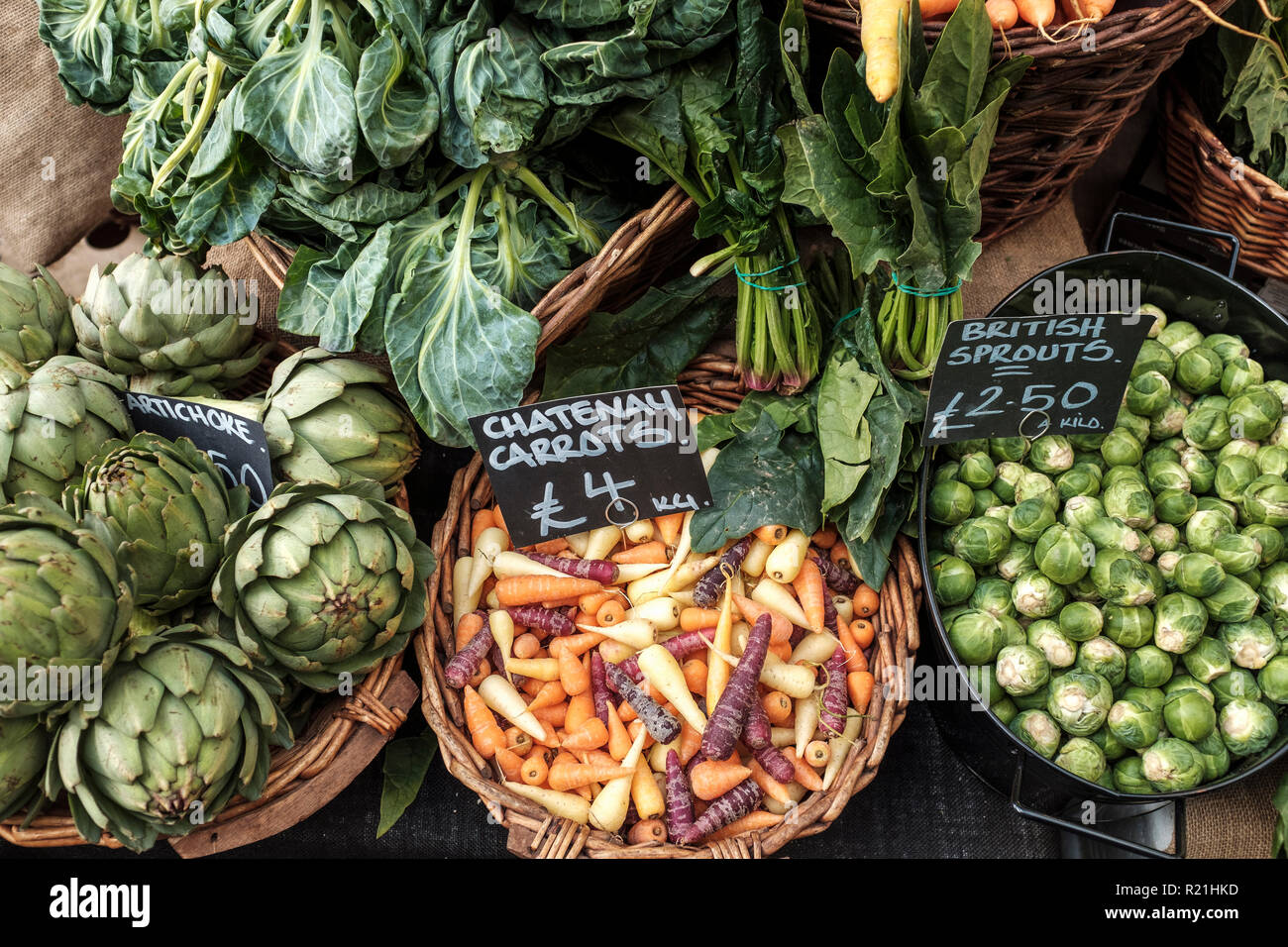 England, London, Borough Market-Organic vegetables on display. Stock Photo