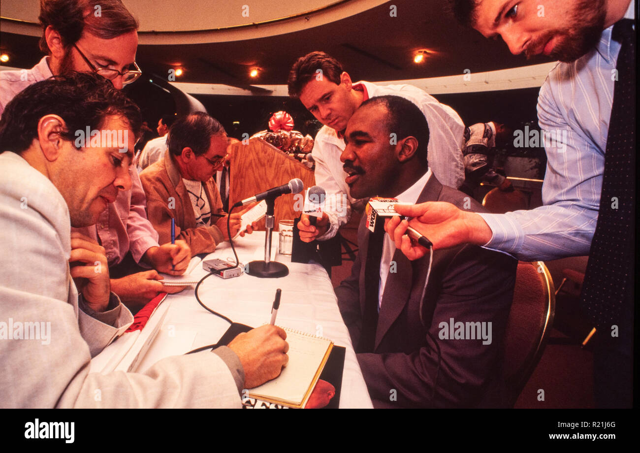 Evander Holyfield during a press conference in Atlanta in 1991 announcing his match against George Foreman. Holyfield is an American former professional boxer who competed from 1984 to 2011. He reigned as the undisputed champion at cruiserweight in the late 1980s and at heavyweight in the early 1990s, and remains the only boxer in history to win the undisputed championship in two weight classes. Nicknamed 'The Real Deal', Holyfield is the only four-time world heavyweight champion, having held the unified WBA, WBC and IBF titles from 1990 to 1992. Stock Photo