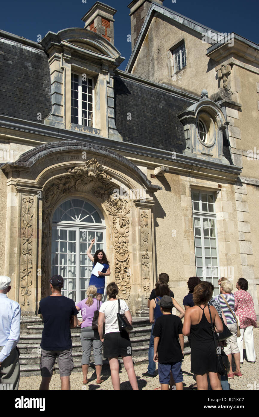 A tour guide tells visitors about Chateau de Cirey (Castle Cirey) in CireysurBlaise, Haute