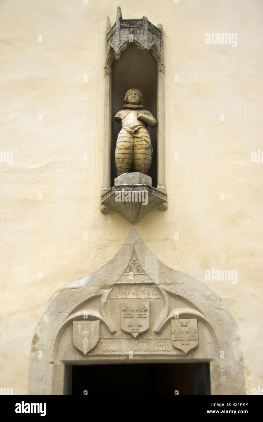 A statue of Joan of Arc over the door to her birthplace at Domremy-la- Pucelle, France. Stock Photo