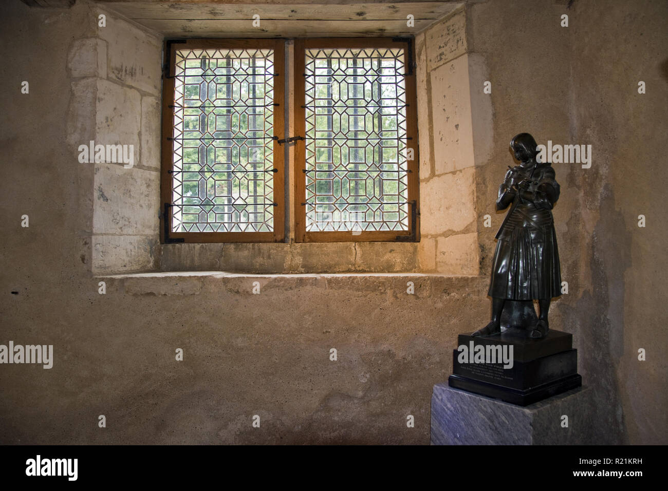 A bronze statue of Joan of Arc stands in the main room at her birthplace at Domremy-la- Pucelle, France. Stock Photo