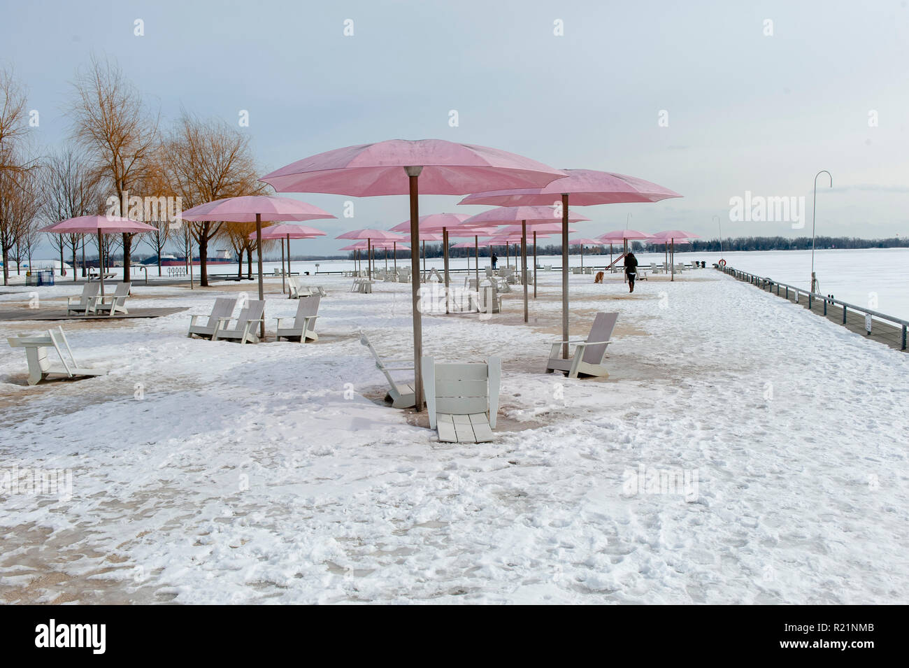 Sugar Beach, Toronto with sun umbrellas after a snow fall Stock Photo