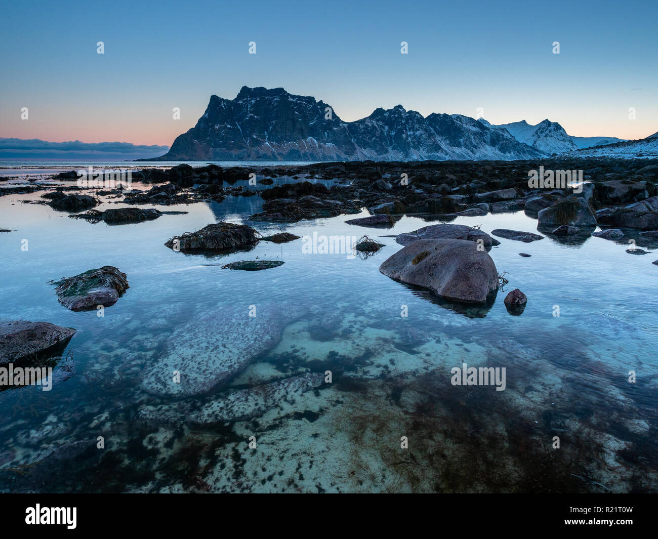 The beach of Haukland in Lofoten, Norway shot just before sunrise Stock ...