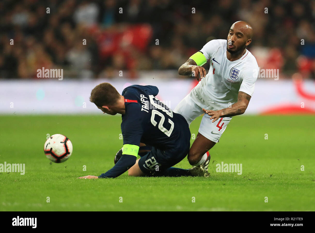 USA's Wil Trapp (left) and England's Fabian Delph battle for the ball during the International Friendly at Wembley Stadium, London. Stock Photo