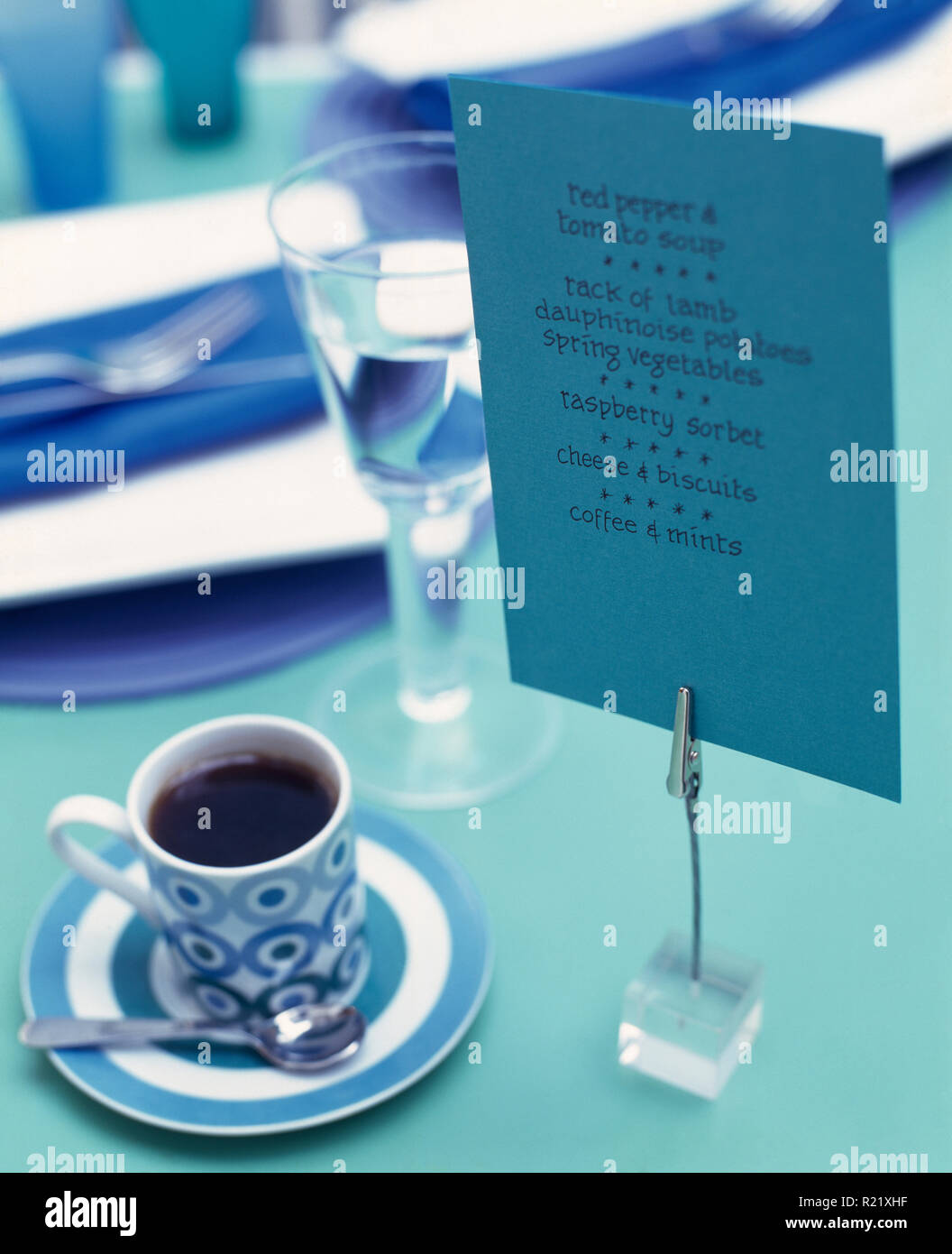 Close-up of a cup of coffee with menu on stand Stock Photo
