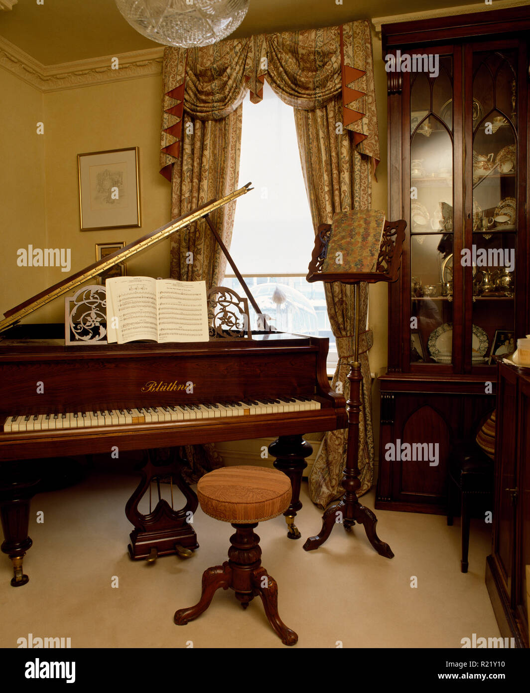 Grand piano in sitting room Stock Photo