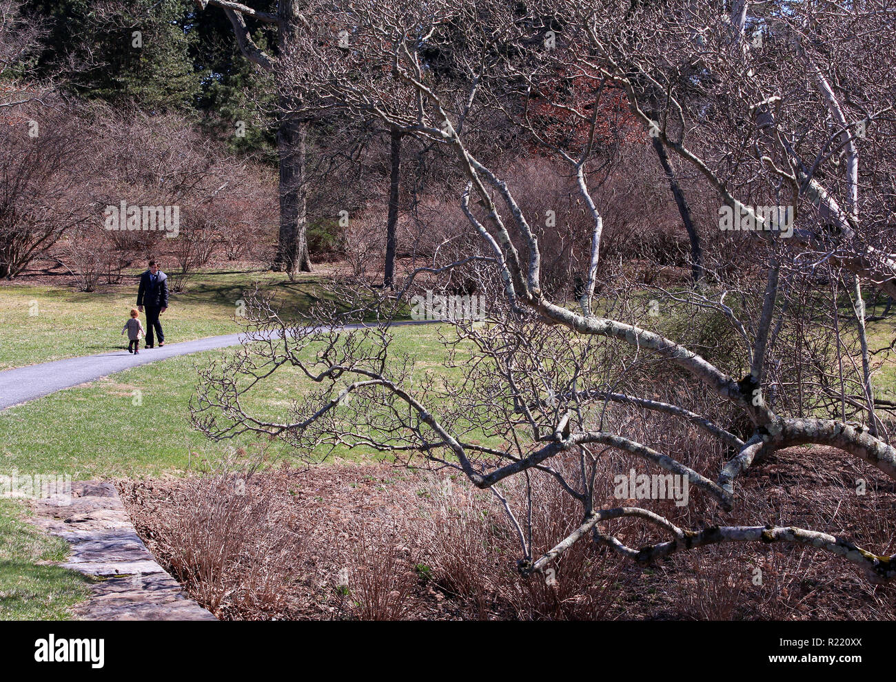 Mother and child walk along a path through Winterthur Garden (Dupont