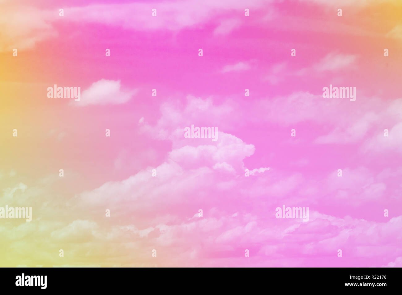 Sweet pastel colored cloud and sky with sun light, soft cloudy with  gradient pastel color background. summer concept Stock Photo - Alamy