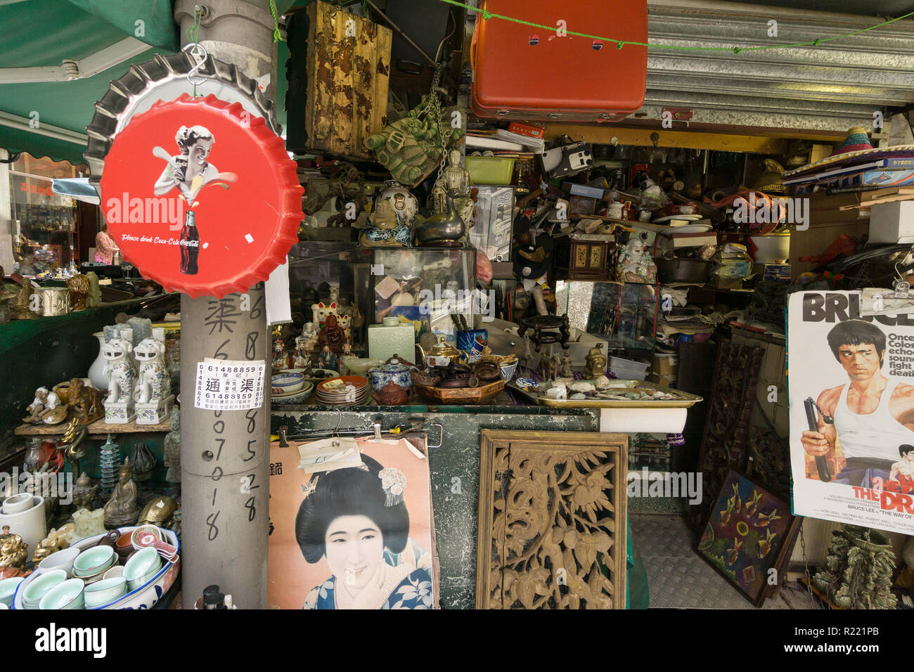 Hong Kong, China - May 24 2018: Antiques, memorabilia and other knick knacks stall in the historic Cat Street market in Soho, Hollywood road in Hong K Stock Photo