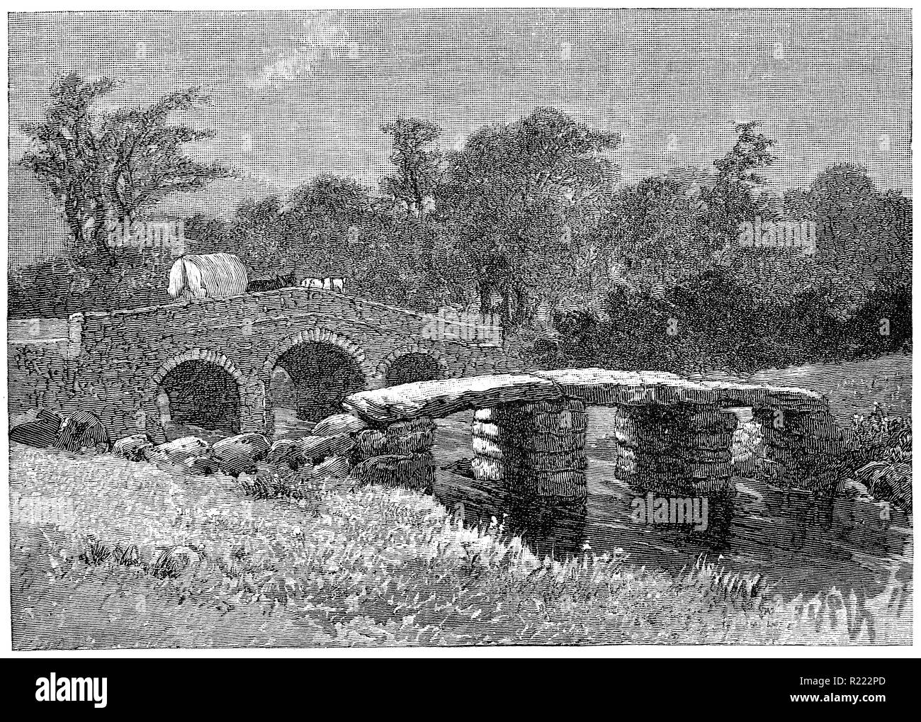 1884 vintage engraving of the medieval clapper bridge over the East Dart River at the village of Postbridge in Dartmoor, Devon, England. From a drawing by L.R. O'Brien. Stock Photo
