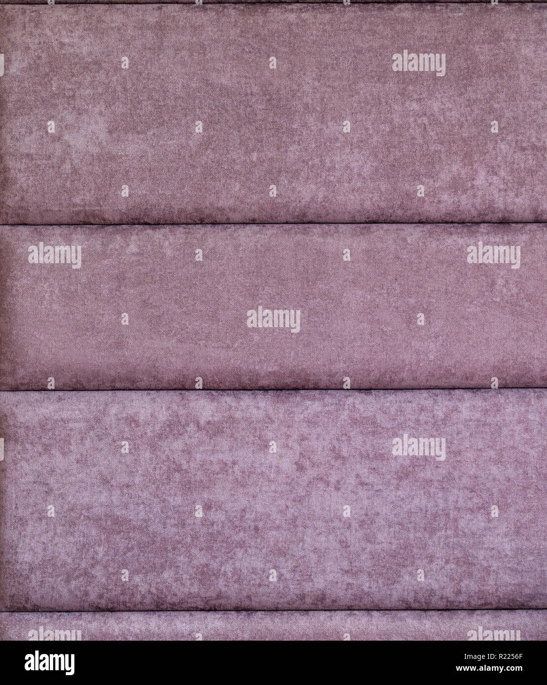 Purple fabric surface, background. Home interior decor. Texture, pattern. Stock Photo