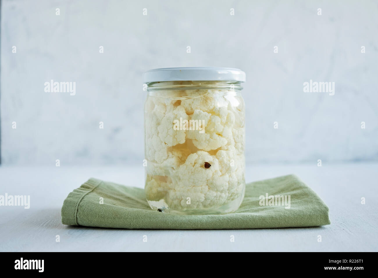 Jar of fermented cauliflower on napkin Stock Photo