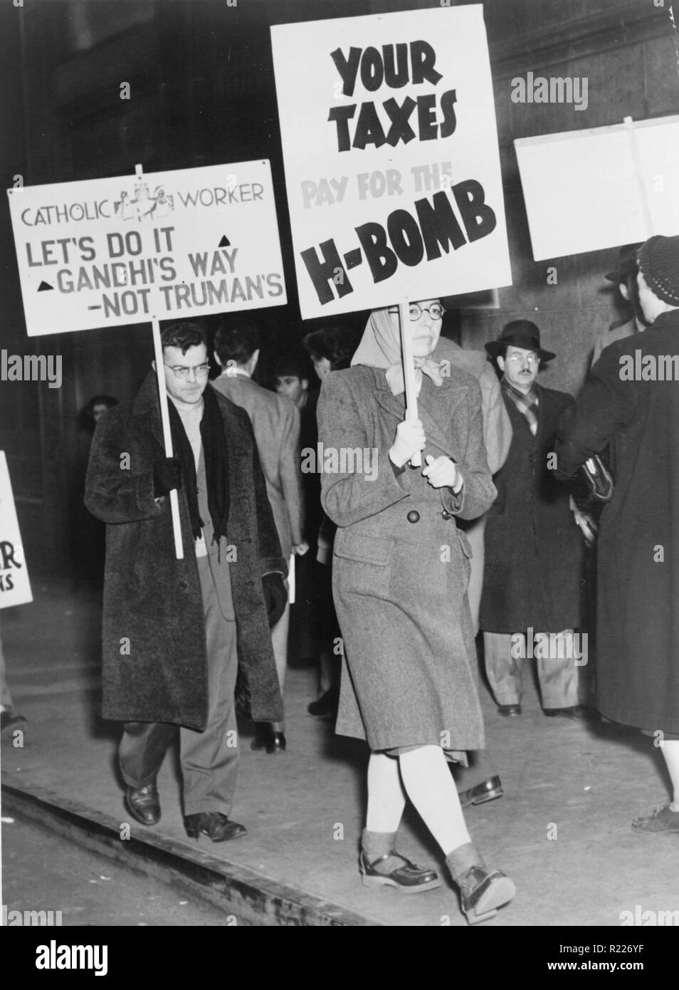 American protesters picketing against the use of tax dollars for the development of nuclear weapons]. Photo by Fred Palumbo. 1950 Stock Photo