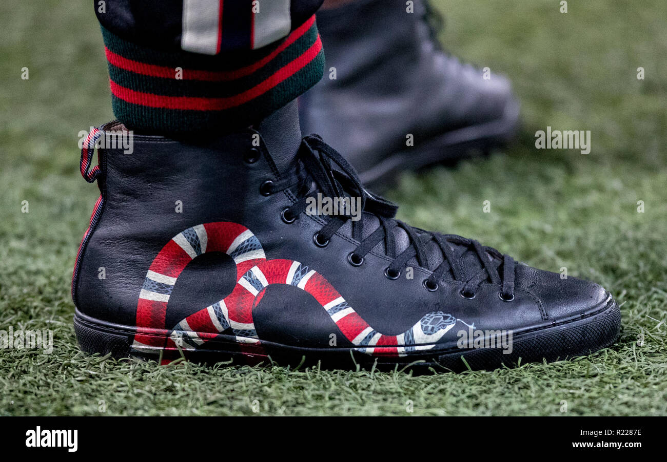 London, UK. 15th November, 2018. The snake printed shoes of Usain BOLT  during the International friendly match between England and USA at Wembley  Stadium, London, England on 15 November 2018. Photo by