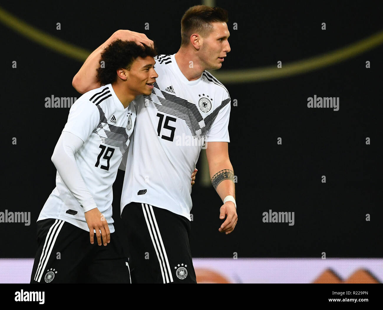Leipzig, Germany. 15th Nov, 2018. Soccer: International matches, Germany - Russia in the RB Arena. The two scorers Leroy Sane (l) from Germany and Niklas Süle cheer over a goal. Credit: Soeren Stache/dpa/Alamy Live News Stock Photo