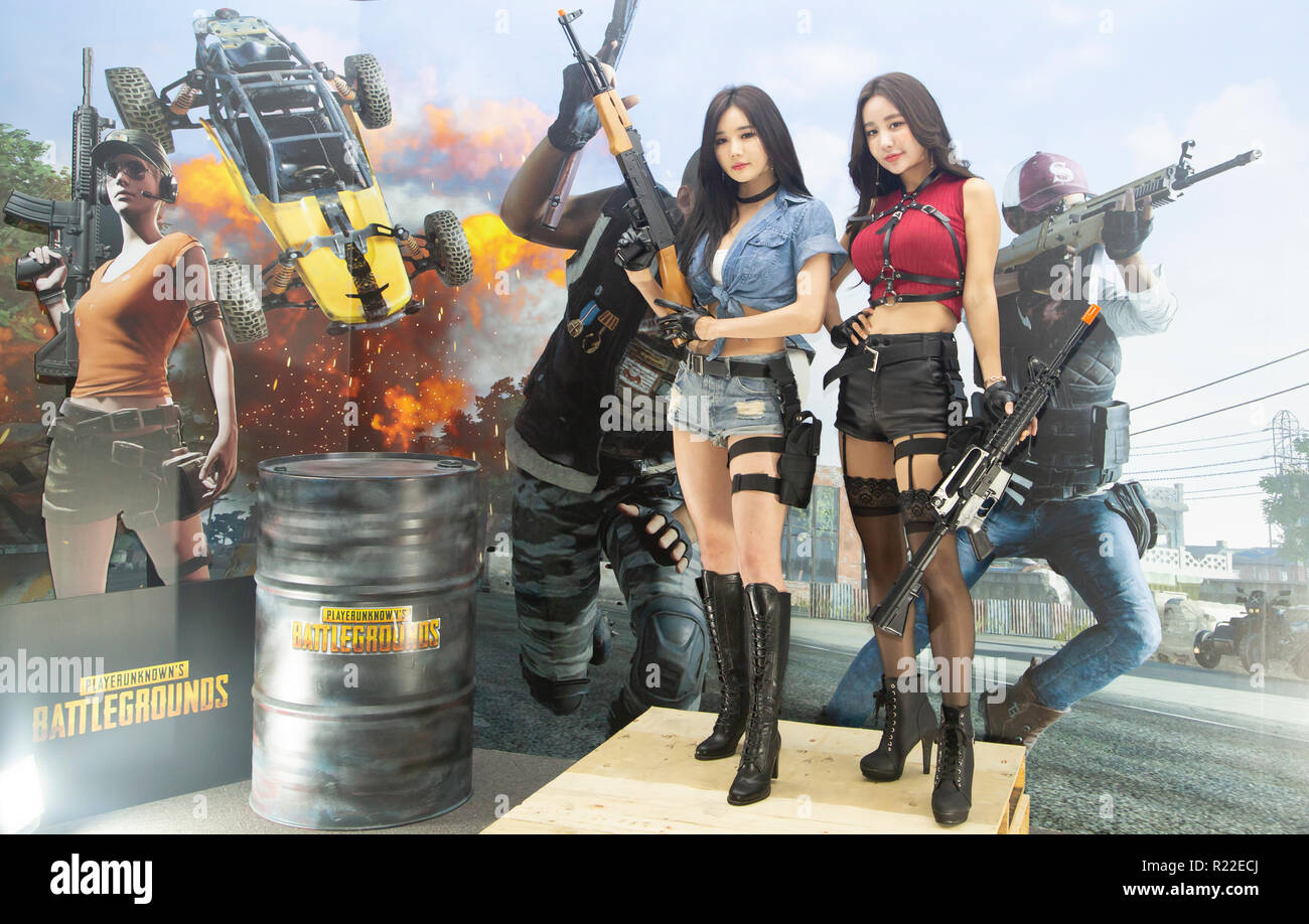 G-Star Global Game Exhibition, Nov 15, 2018 : Promotional models wearing  the costumes of online game, PlayerUnknown's Battlegrounds, pose at the G- Star Global Game Exhibition in Busan, about 420 km (261 miles)
