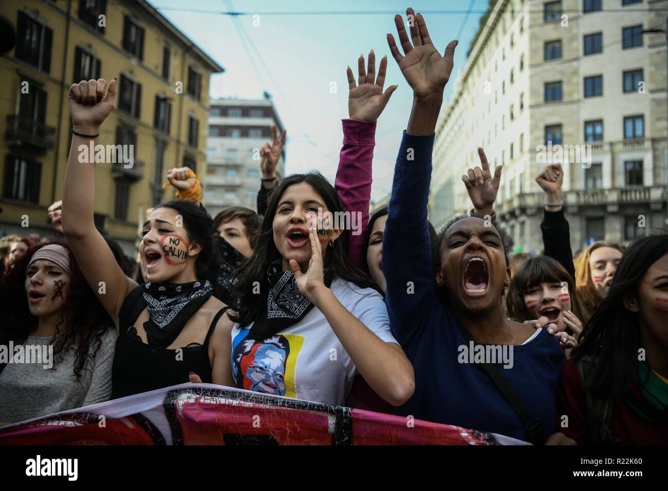 Milan, Italy - November 16, 2018: Young female protesters chant and display notes on their cheeks that read 'No Salvini' while demonstrating during the 'No Salvini Day' students protest Credit: Piero Cruciatti/Alamy Live News Stock Photo